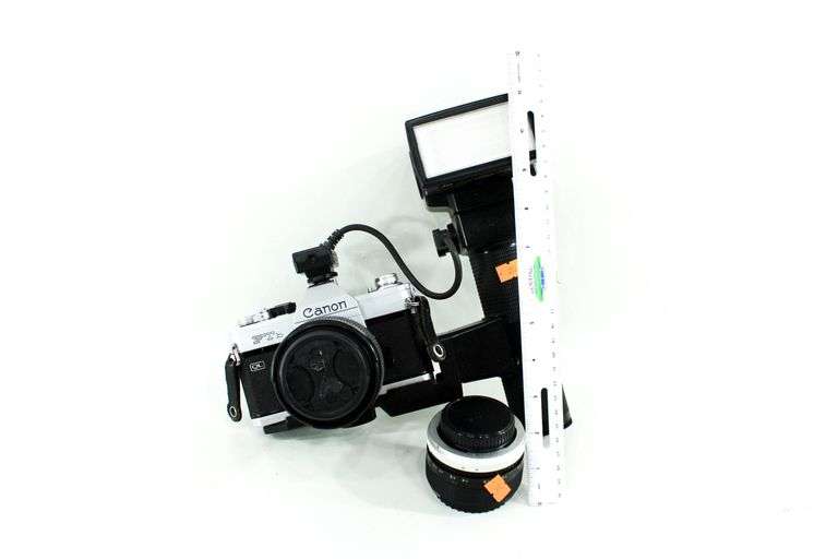 Canon FTb QL 35mm SLR Film Camera with Canon FD mount lens and an External Flash Unit.