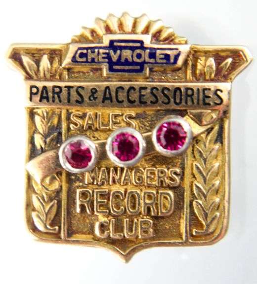 14 KT Gold Service Pin for "Chevrolet Parts & Accessories Managers Record Club" studded with Rubies.     (2.35 gm t.wt)