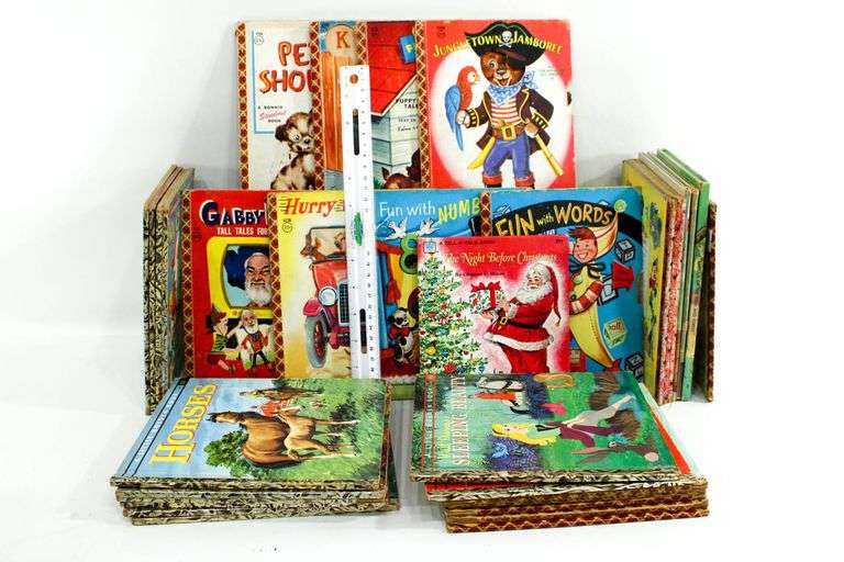 Vintage Young Readers Books.  Walt Disney's Jiminy Cricket Fire Fighter A Mickey Mouse Club Book, The three billy Goats Gruff, A Little Golden Book "Lassie" and the daring Rescue, Annie Oakley Sharpshooter & More. FRONT LEFT WALL