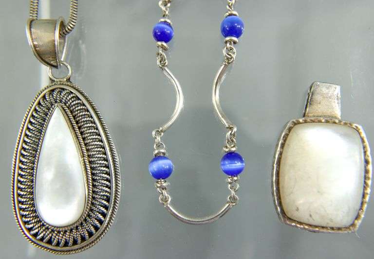 Sterling Silver Necklaces , 18", and Sterling Mother of Pearl Pendants.
