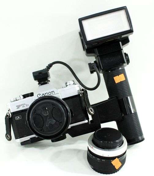 Canon FTb QL 35mm SLR Film Camera with Canon FD mount lens and an External Flash Unit.