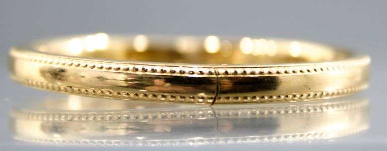 14 KTGF child's hinged bangle Bracelet, in a gift box.