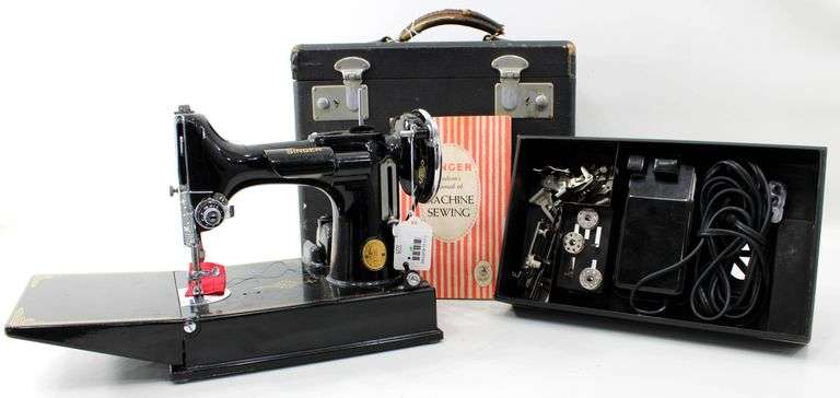 1930s/1940s Singer Featherweight. Serial number AF080436. Catalog 3-110 | 700 Black & Gold Sewing Machine with Case, Manual, and Accessories - Consignor contributes last serviced 7/16/2025 "Works Great"