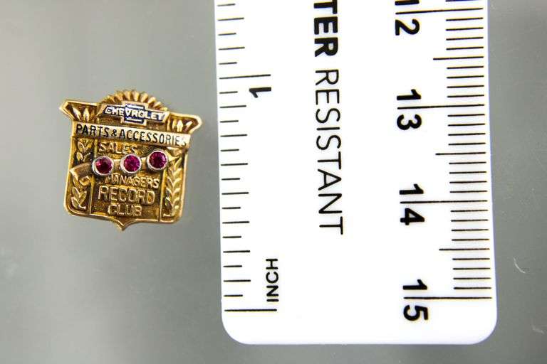 14 KT Gold Service Pin for "Chevrolet Parts & Accessories Managers Record Club" studded with Rubies.     (2.35 gm t.wt)