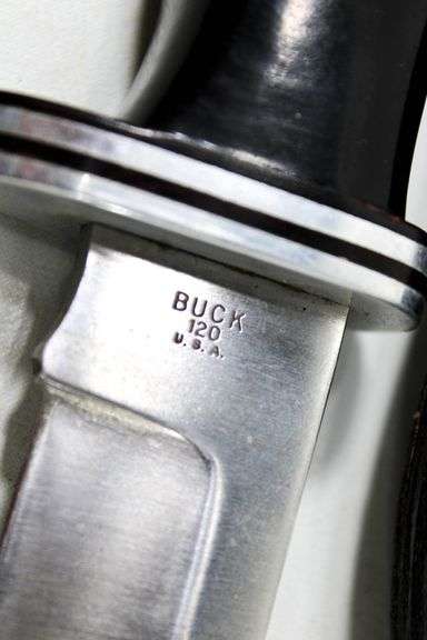 Buck Model 120 fixed blade hunting knife with leather scabbard , Appears to have never been used or resharpened