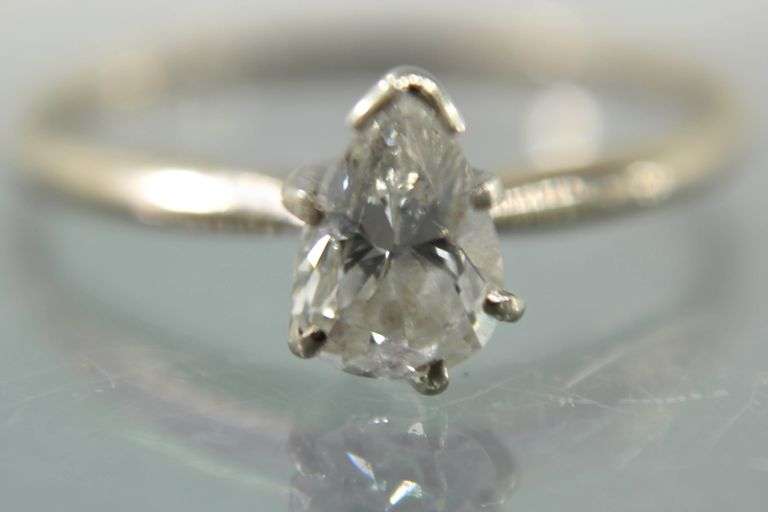 14KT Gold and Diamond (tested - 0.6 cts.) Ring. 1.6g.  Size 7.5