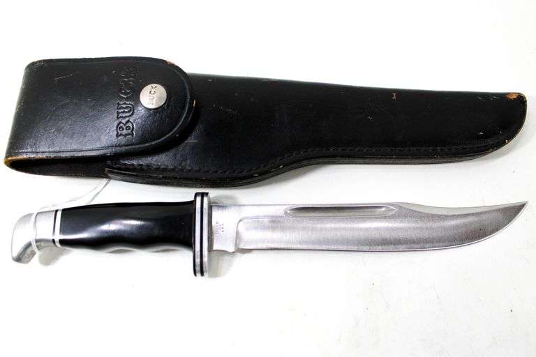 Buck Model 120 fixed blade hunting knife with leather scabbard , Appears to have never been used or resharpened