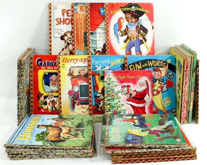 Vintage Young Readers Books.  Walt Disney's Jiminy Cricket Fire Fighter A Mickey Mouse Club Book, The three billy Goats Gruff, A Little Golden Book "Lassie" and the daring Rescue, Annie Oakley Sharpshooter & More. FRONT LEFT WALL