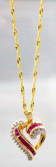 14KT Gold, Diamond, and Ruby (both tested) Pendant and 14KT Gold Necklace.  7gtw.