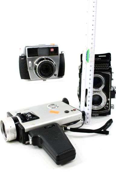 Vintage Cameras:  Baldessamat-F 35mm Film Camera (Made 1958 to 1967) - and - Ricoh Twin Lens Reflex Camera Seikosha-SLV 120 Film - and - Yashica Electro 8 YXL-Zoom 25 Magnetic Release Silent Super 8 (Marketed 1974)