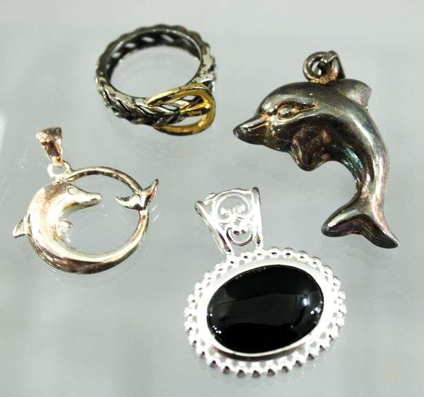 Sterling Silver Dolphin Pendants,  an oval Onyx Sterling Pendant and a Sterling buckle Ring, size 5