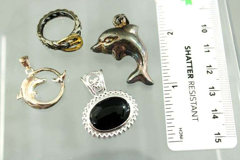 Sterling Silver Dolphin Pendants,  an oval Onyx Sterling Pendant and a Sterling buckle Ring, size 5