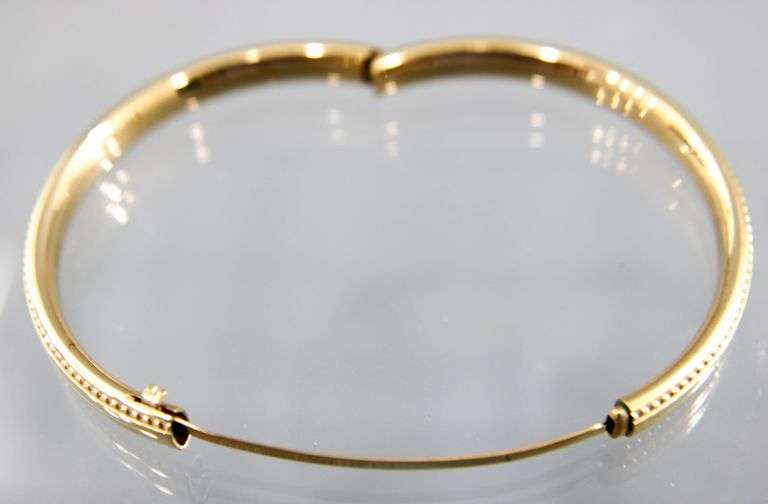 14 KTGF child's hinged bangle Bracelet, in a gift box.