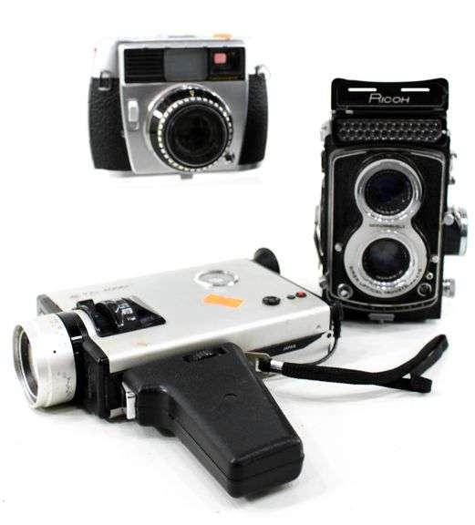 Vintage Cameras:  Baldessamat-F 35mm Film Camera (Made 1958 to 1967) - and - Ricoh Twin Lens Reflex Camera Seikosha-SLV 120 Film - and - Yashica Electro 8 YXL-Zoom 25 Magnetic Release Silent Super 8 (Marketed 1974)