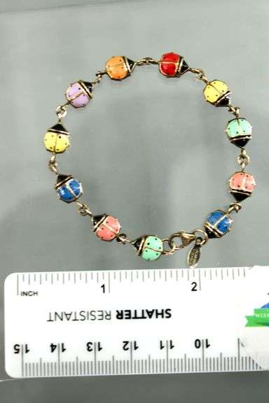 Sterling Silver and 14 KTGF Bracelet of enameled double sided lady bugs, 7"