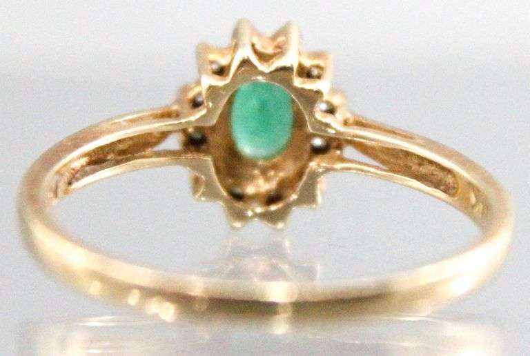 14KT Gold, Diamond, and Emerald (both tested) Ring. 2.2g. Size 7.5.