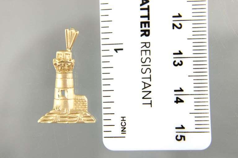 14 KT Gold Lighthouse Pendant.     (1.91 gm)