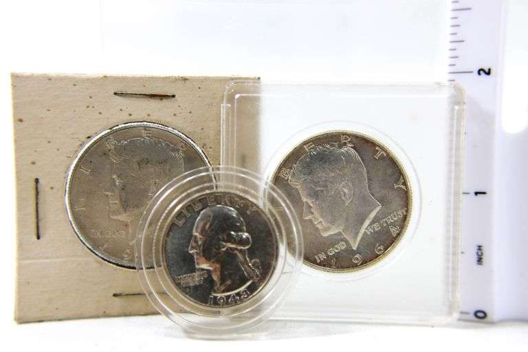 1964 Kennedy silver half dollars and a 1943 Washington Silver Quarter