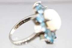 Topaz, Moonstone (both tested),  and Sterling Silver Ring, size 7.