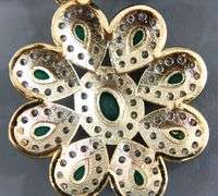 Necklace of emerald green faceted beads with a gorgeous dazzling Pendant.
