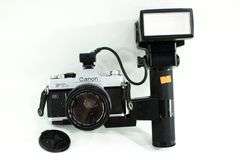 Canon FTb QL 35mm SLR Film Camera with Canon FD mount lens and an External Flash Unit.