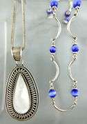 Sterling Silver Necklaces , 18", and Sterling Mother of Pearl Pendants.