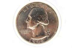 1964 Kennedy silver half dollars and a 1943 Washington Silver Quarter