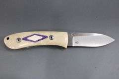 Dozier , Arkansas made custom folding knife ,  D2 marked blade with Bone scales with inlayed fossil coral ? , circa 2002
