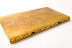 Vintage Art Deco Powder Compact.  Gold-Tone with Engraved Scenic Safari Jungle Animals, Palm Trees, and Flowers.