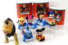 Disney Funko Action Toy Figurines - and - Hot Wheel Past Present Future Holiday Ornaments in Boxes - and - "Lion" Figural Learning Toy by AAA Toys - and - More