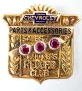 14 KT Gold Service Pin for "Chevrolet Parts & Accessories Managers Record Club" studded with Rubies.     (2.35 gm t.wt)