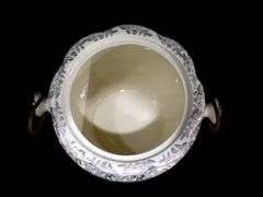 Empire Porcelain Company - Marked England - 1896-1967 - Double Handle Vessel with Rattan Bail Handle and Lid
