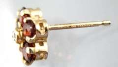 14 KT Gold Earrings and backs, set with red Tourmaline.     (1.35 gm t.wt)