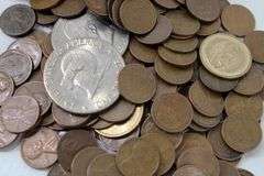 300 Wheat Pennies, three 1976 Eisenhower Dollars, 4 "gold" dollars , 2 Susan B Anthony dollars and more a