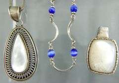 Sterling Silver Necklaces , 18", and Sterling Mother of Pearl Pendants.