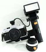Canon FTb QL 35mm SLR Film Camera with Canon FD mount lens and an External Flash Unit.