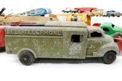 Vintage Toys:  Hubley Metal Toy Ford Tractor - and - Hornby Wind-Up Speed Boat with Distressed Box - and - Structo Fireball Motor - and - 1940s Banner Pressed Steel Toy Tow Truck Banner Wrecking Service #1141 Found as Rare - and - 1960s Lemezaru Gyar Holdauto Atomic Race Car Rocket Tin Litho Toy Made in Hungary - and - More