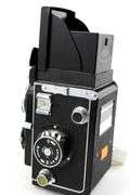 Vintage Cameras:  Baldessamat-F 35mm Film Camera (Made 1958 to 1967) - and - Ricoh Twin Lens Reflex Camera Seikosha-SLV 120 Film - and - Yashica Electro 8 YXL-Zoom 25 Magnetic Release Silent Super 8 (Marketed 1974)