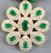 Necklace of emerald green faceted beads with a gorgeous dazzling Pendant.