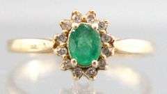 14KT Gold, Diamond, and Emerald (both tested) Ring. 2.2g. Size 7.5.