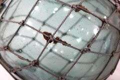 Vintage Glass Fishing Float Aquamarine Netted.
