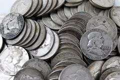ONE HUNDRED ( 100 ) SILVER Franklin half dollars , $50 Face value