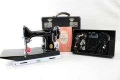 1930s/1940s Singer Featherweight. Serial number AF080436. Catalog 3-110 | 700 Black & Gold Sewing Machine with Case, Manual, and Accessories - Consignor contributes last serviced 7/16/2025 "Works Great"
