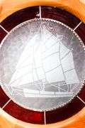 Stained Glass Sailing Ship Centerpiece in Wooden Ship's Wheel Frame - 21" Dia