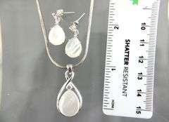 Sterling Silver Necklace and Earring set with Mother of Pearl and white Topaz (tested), in a gift box.