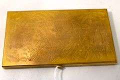 Vintage Art Deco Powder Compact.  Gold-Tone with Engraved Scenic Safari Jungle Animals, Palm Trees, and Flowers.