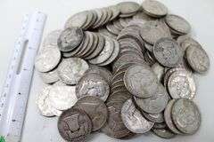 ONE HUNDRED ( 100 ) SILVER Franklin half dollars , $50 Face value