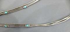 Liquid Silver lariat Necklace threaded with Turquoise, adjustable.