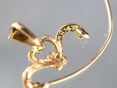 14 KT Gold charm holder Pendant.    ( 1.08 gm)