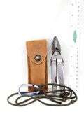Vintage Gerber Multi tool in leather pouch .